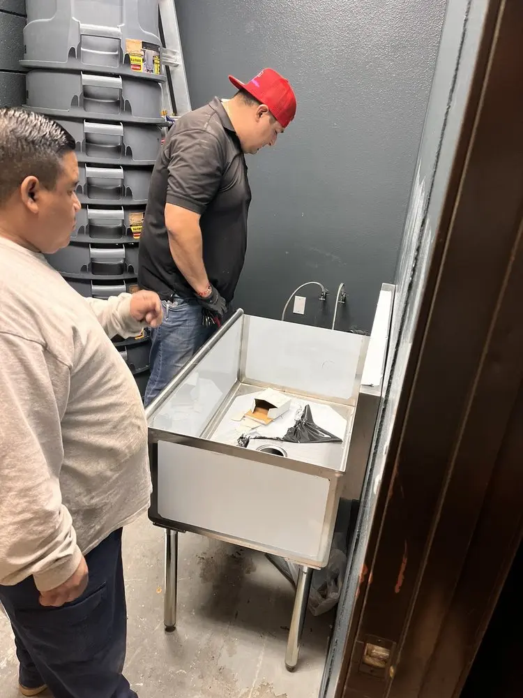 Commercial plumbing and sink installation in Seville